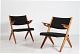 Dansk Møbeldesign
Par lette easy chairs af massiv eg og teak